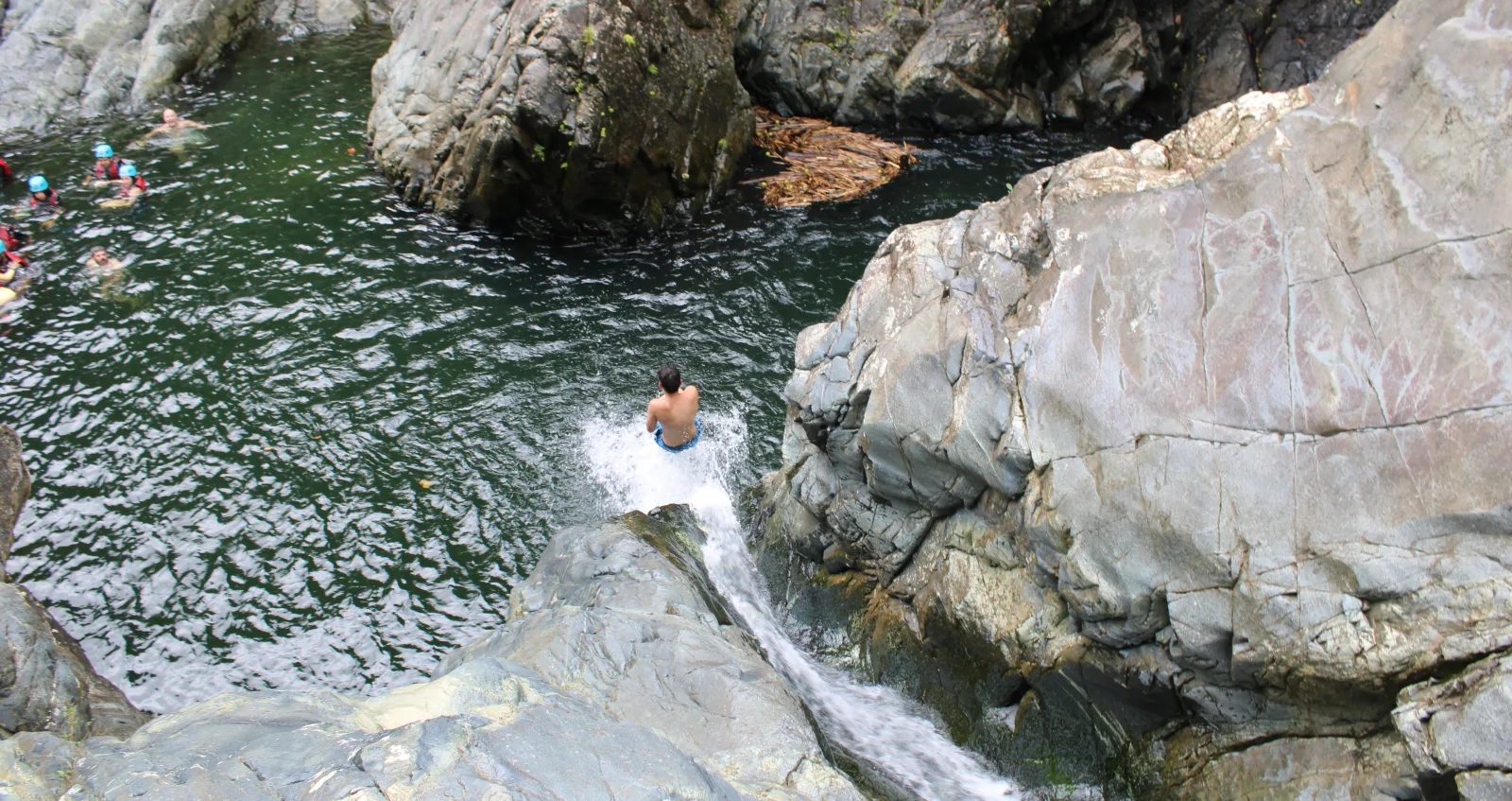 From San Juan: El Yunque Waterslide with Transportation